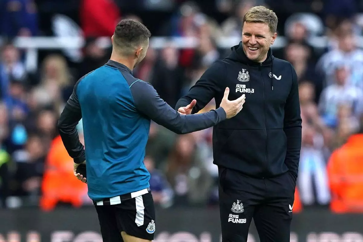 Newcastle United manager Eddie Howe (right) and Kieran Trippier shake hands