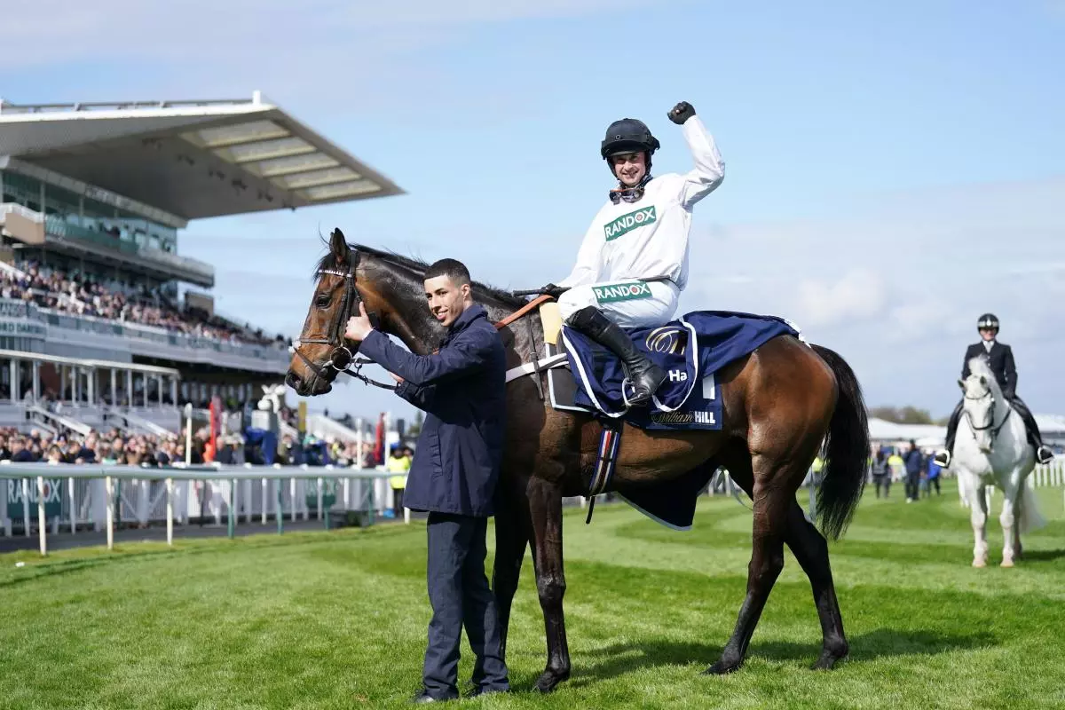 Nico de Boinville celebrates winning the William Hill Aintree Hurdle on board Constitution Hill