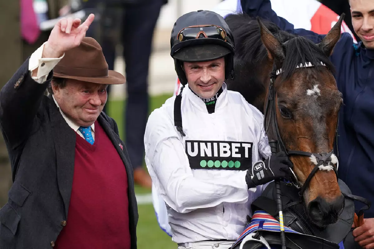 Nico de Boinville and Nicky Henderson celebrate Supreme Novices Hurdle with Constitution Hill