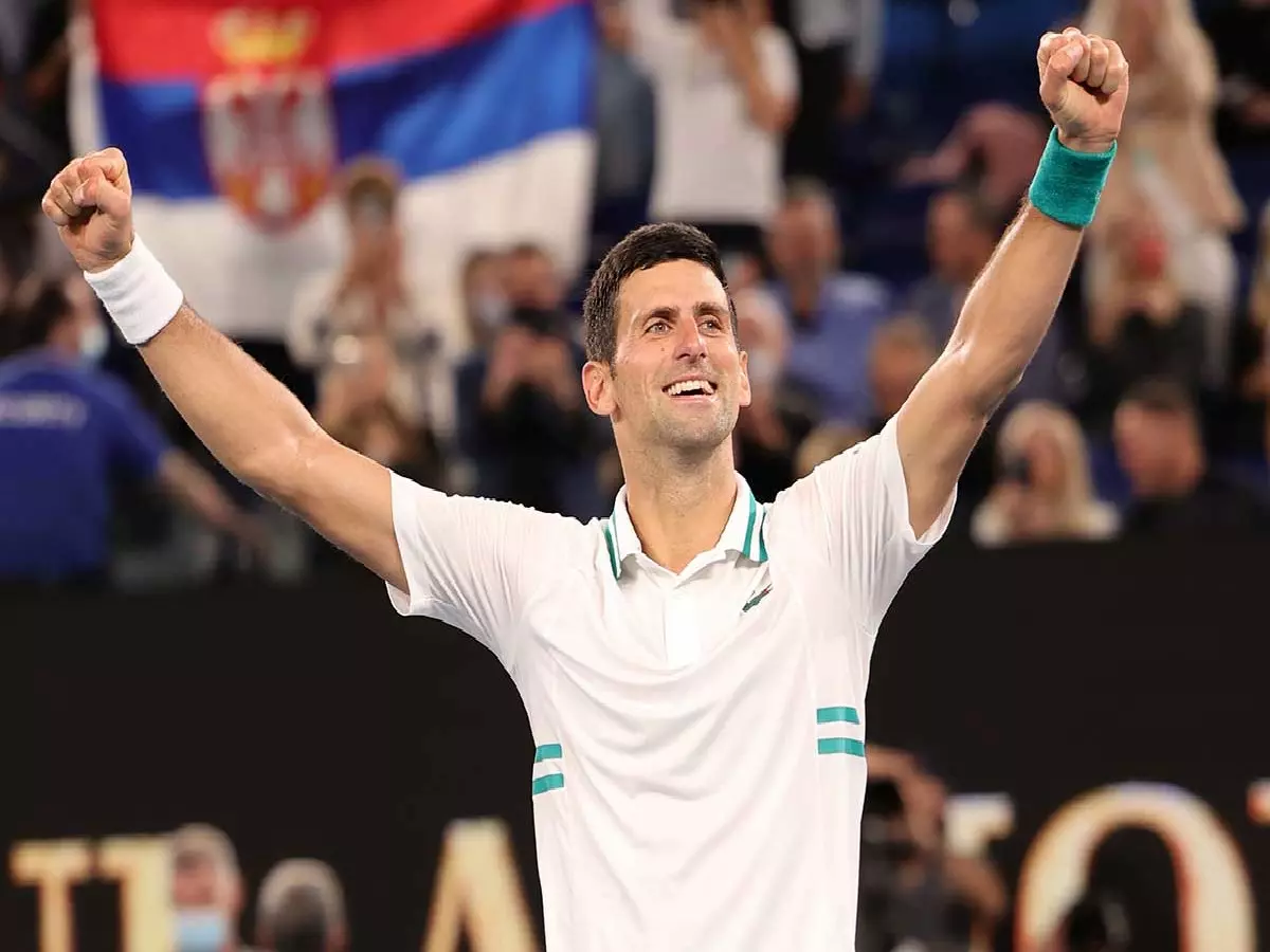Novak Djokovic celebrates Australian Open win