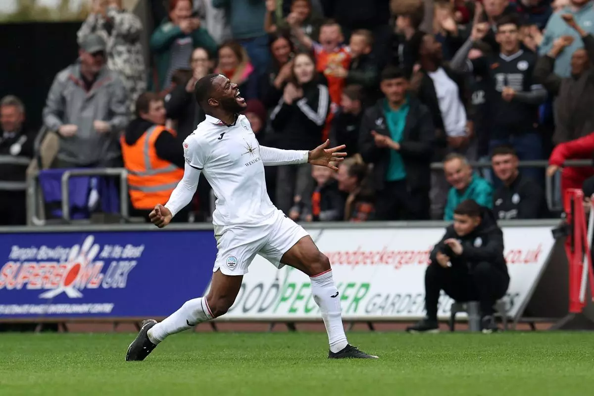 Olivier Ntcham of Swansea City celebrates