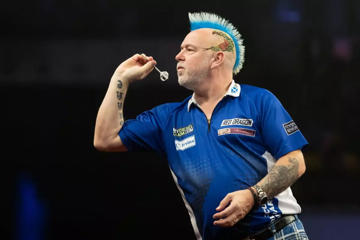 Peter Wright throws in Scotland's quarterfinal match against France at the Darts World Team Championship - June 2023