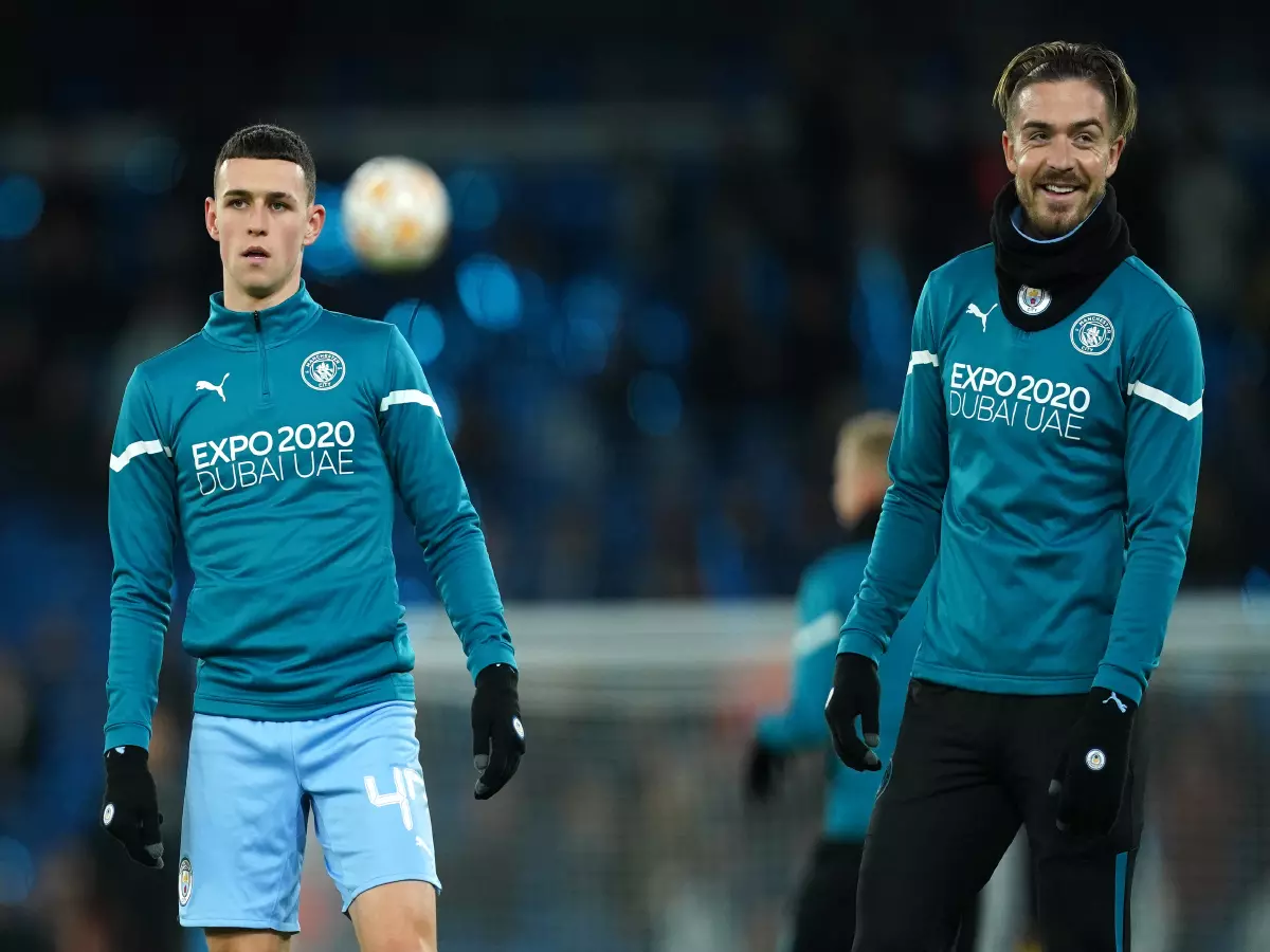Manchester City's Phil Foden (left) and Jack Grealish warm up prior to the UEFA Champions League Group A match at the Etihad Stadium, Manchester. Picture date: Wednesday November 3, 2021.