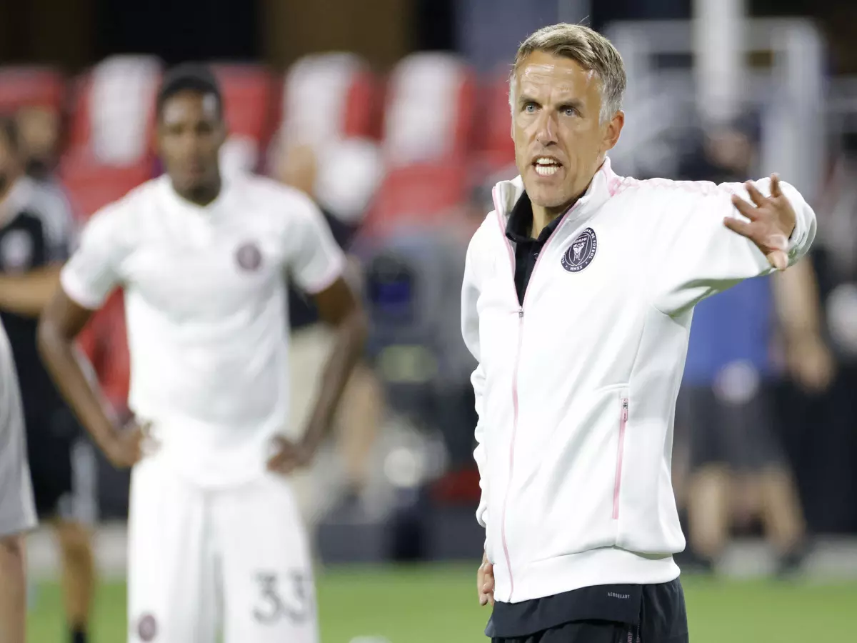 Inter Miami head coach Phil Neville gestures to his players after the match against D.C. United at Audi Field