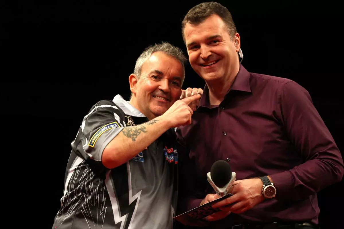 Phil Taylor with Sky Sports presenter Dave Clark - March 2012