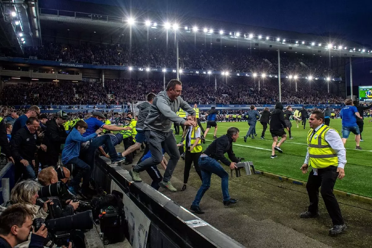Everton fans invade the pitch