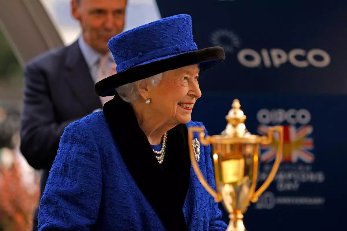 Queen Elizabeth II ahead of presenting the trophy after the Queen Elizabeth II Stakes