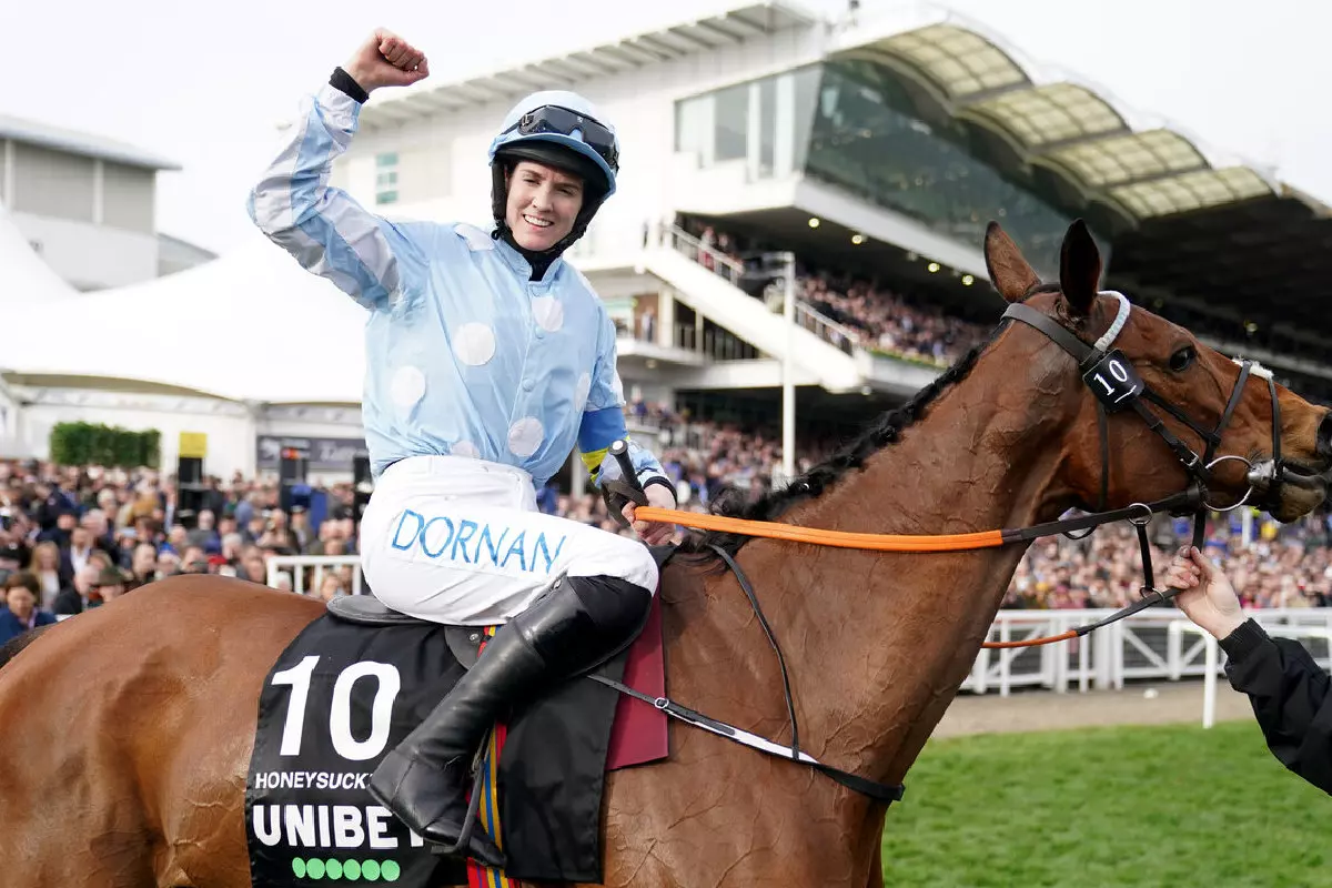 Rachael Blackmore celebrates on Honeysuckle after winning Champion Hurdle