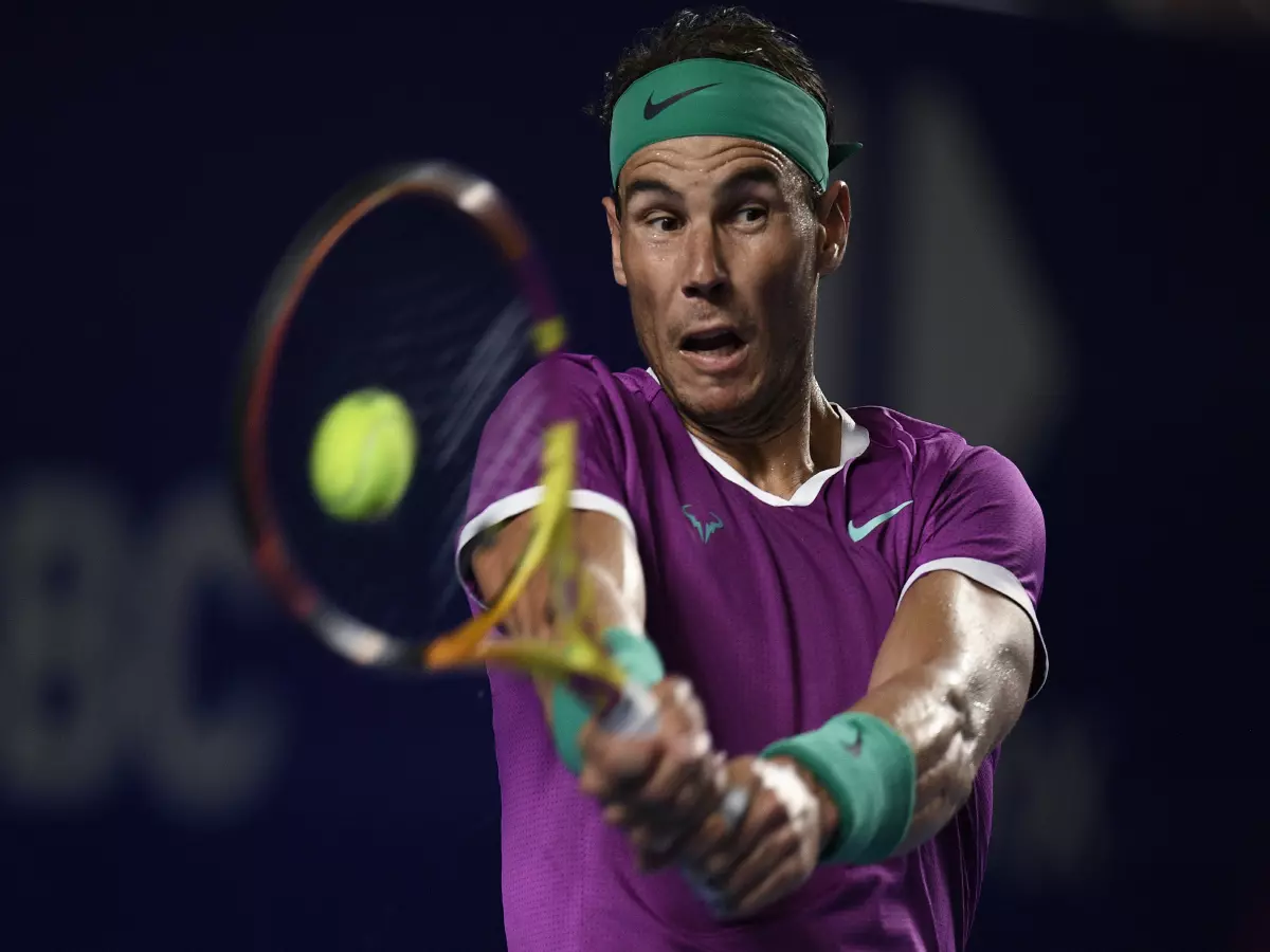 Rafael Nadal of Spain hits a return during the men's singles round of 16 match against Stefan Kozlov of the United States at the 2022 ATP Mexican Open tennis tournament in Acapulco, Mexico, F