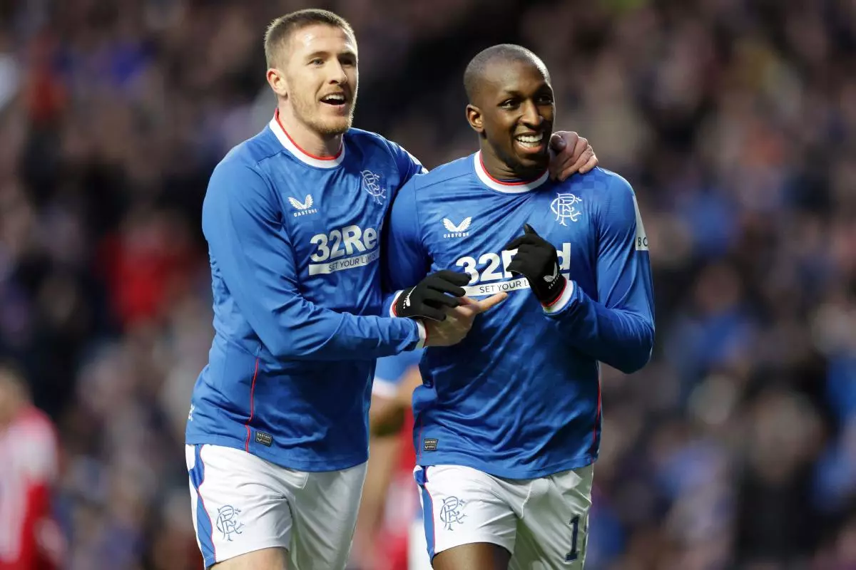 Rangers' Glen Kamara (right) celebrates scoring their side's second goal of the game