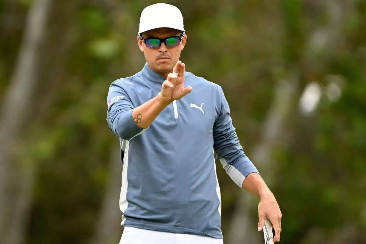 Rickie Fowler lines up his putt on the 17th green during the first round of the 2023 U.S. Open - June 2023