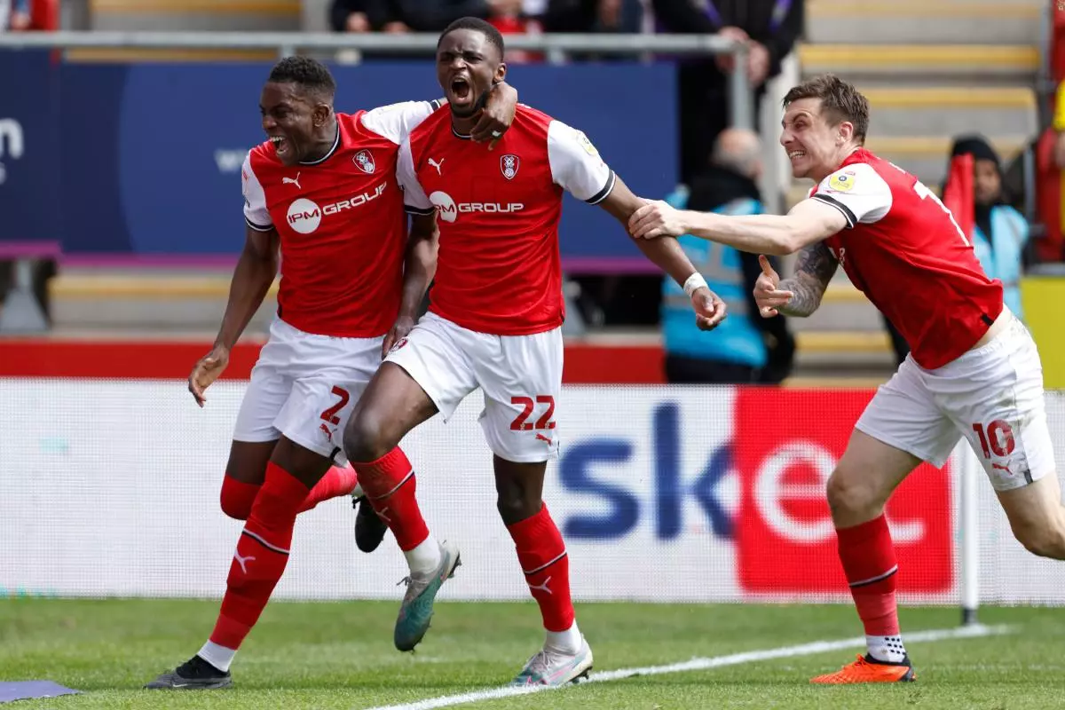 Rotherham United’s Hakeem Odoffin (centre) celebrates after scoring