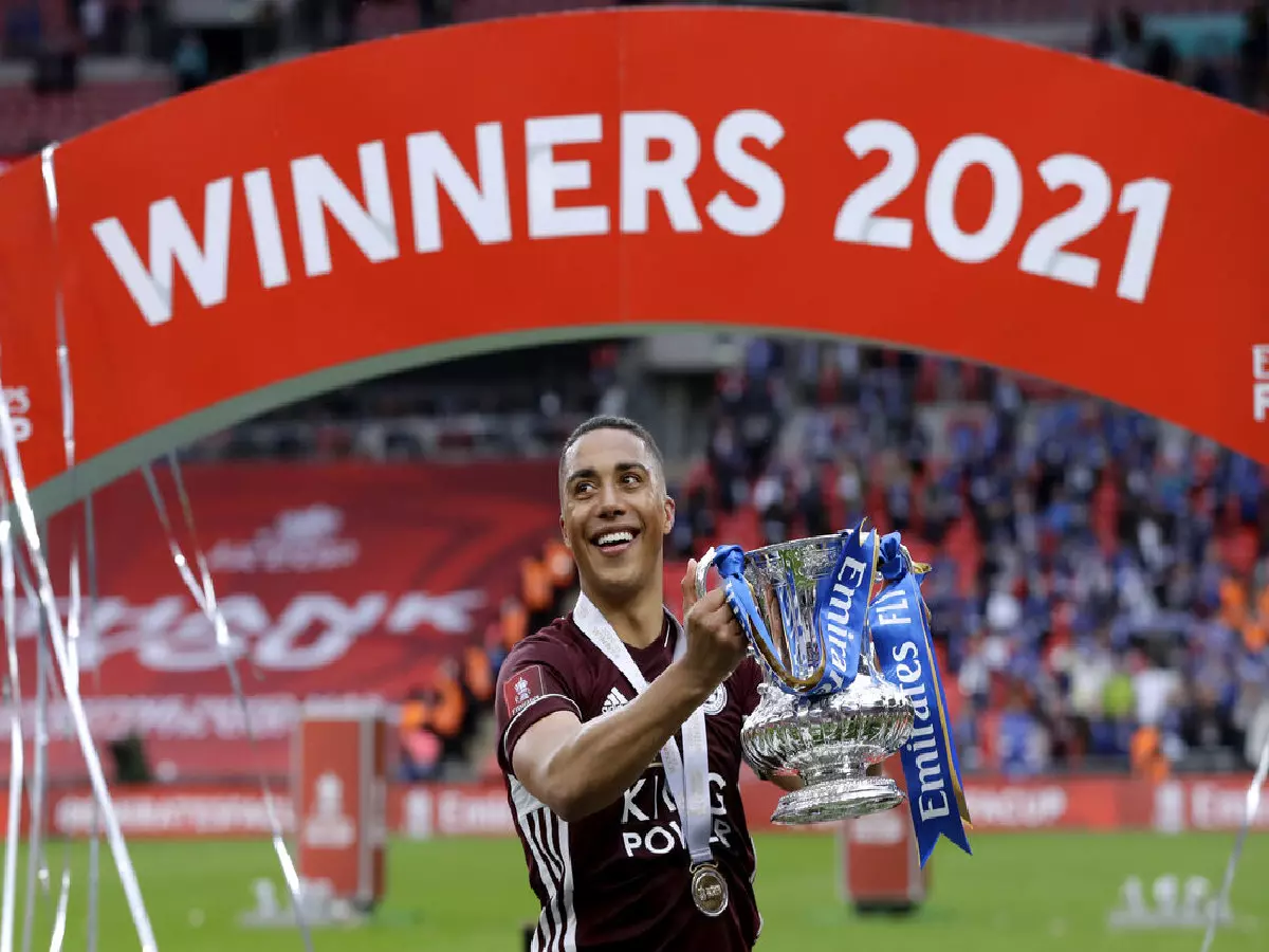 Leicester City's Youri Tielemans celebrates with the trophy after winning the Emirates FA Cup Final at Wembley Stadium, London. Picture date: Saturday May 15, 2021.
