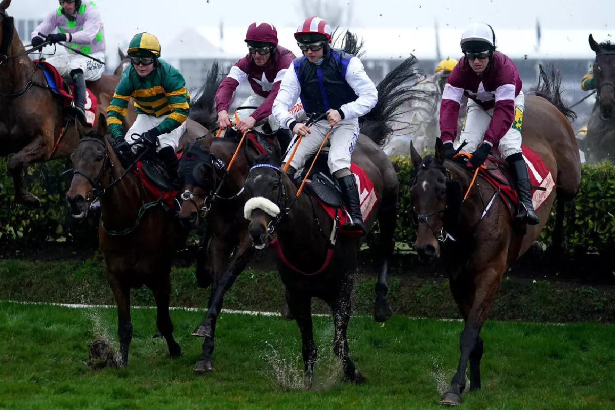 Runners and riders jump first fence Glenfarclas Chase