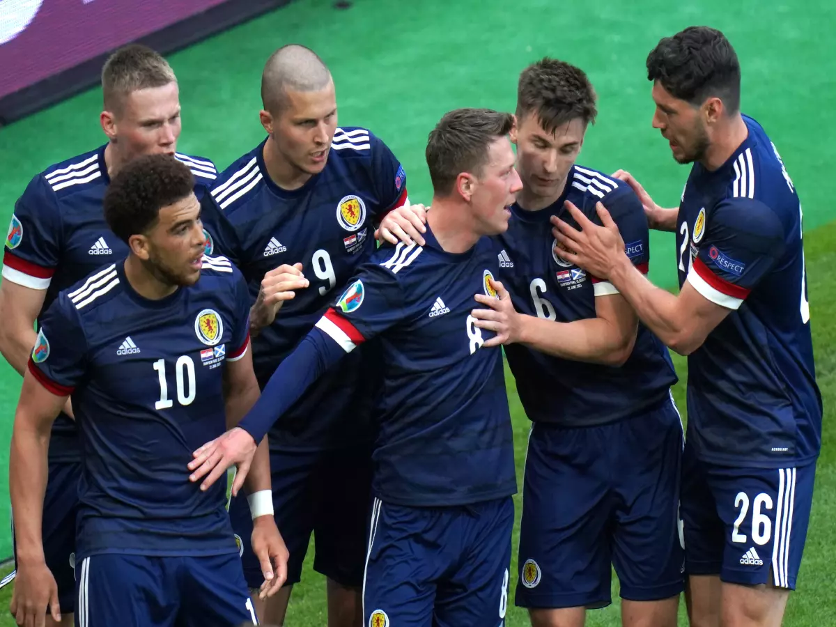Scotland's Callum McGregor (centre) celebrates scoring their side's first goal of the game during the UEFA Euro 2020 Group D match at Hampden Park