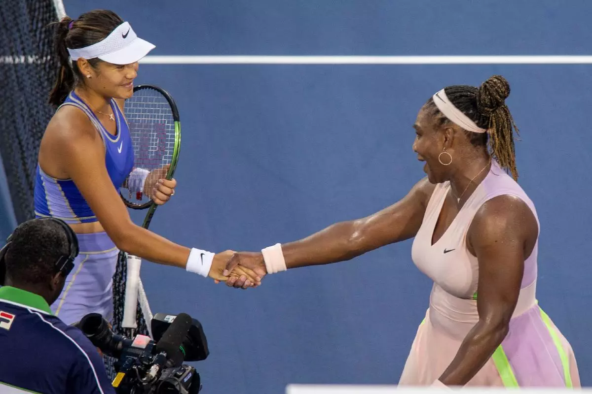 Serena Williams congratulates opponent Emma Raducanu