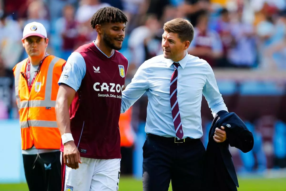 Aston Villa Head Coach Steven Gerrard congraulates Tyrone Mings