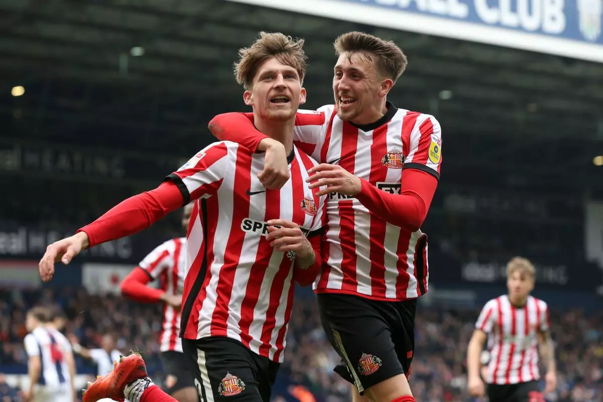 Sunderland's Dennis Cirkin celebrates with Sunderland's Dan Neil after scoring their side's first goal of the game during the Sky Bet Championship match - April 2023