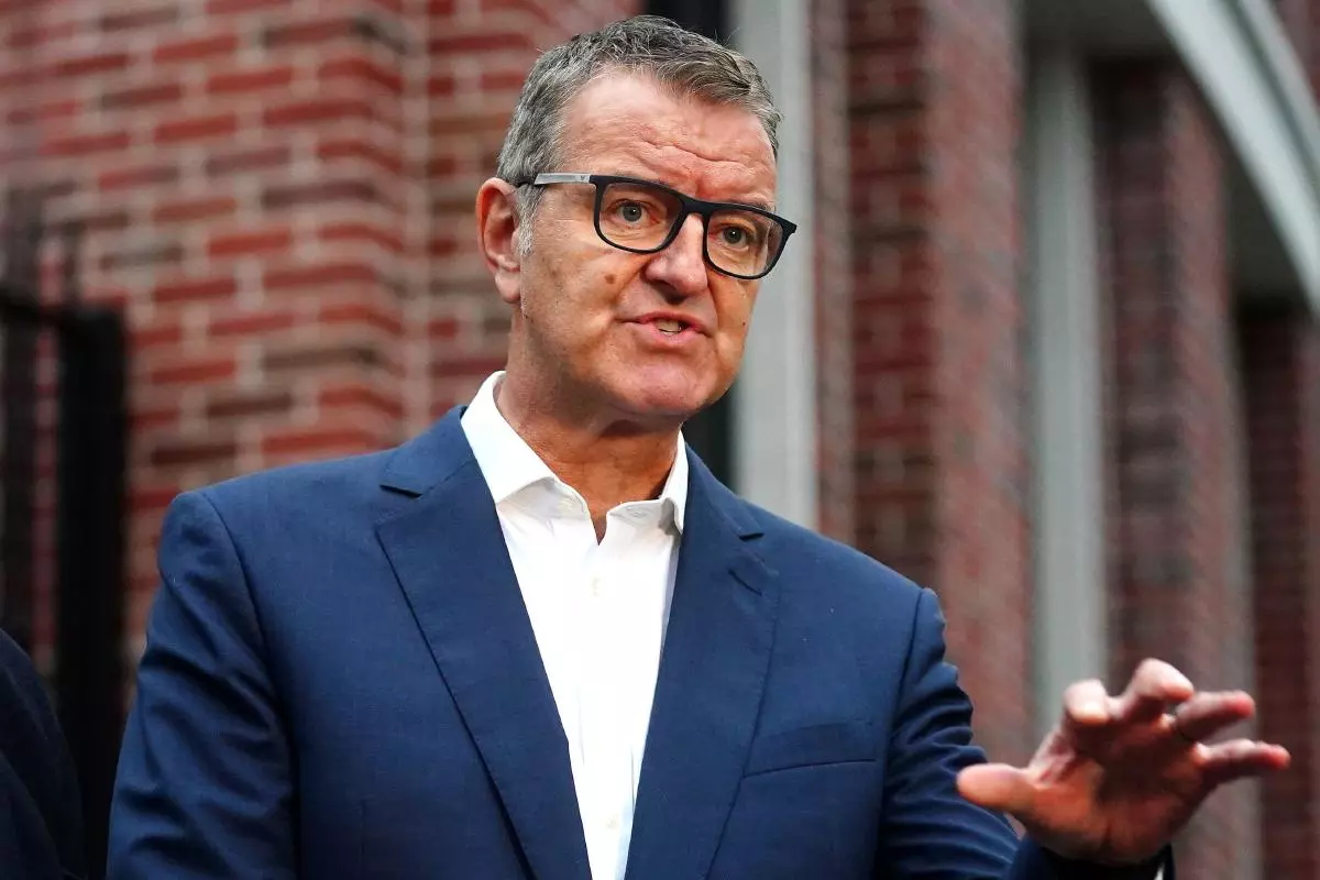 Surrey County Cricket Club chairman Richard Thompson (right)