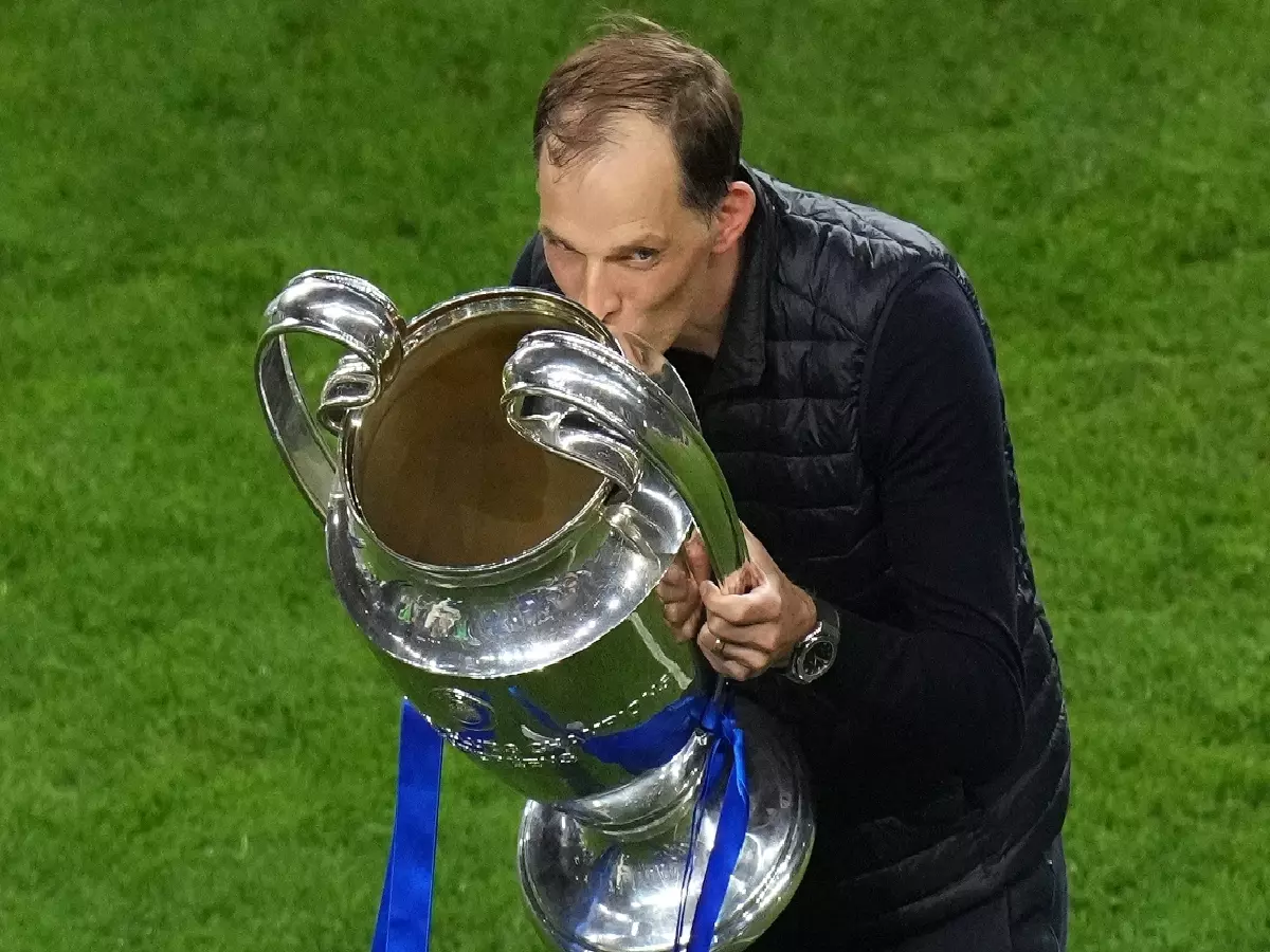 Thomas Tuchel celebrating with the Champions League trophy