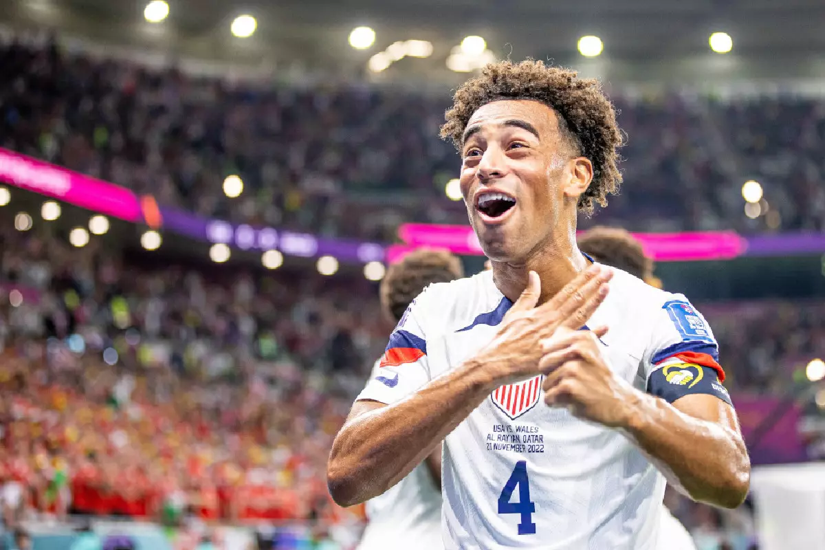 Tyler Adams celebrates scoring for USA against Wales Nov 22