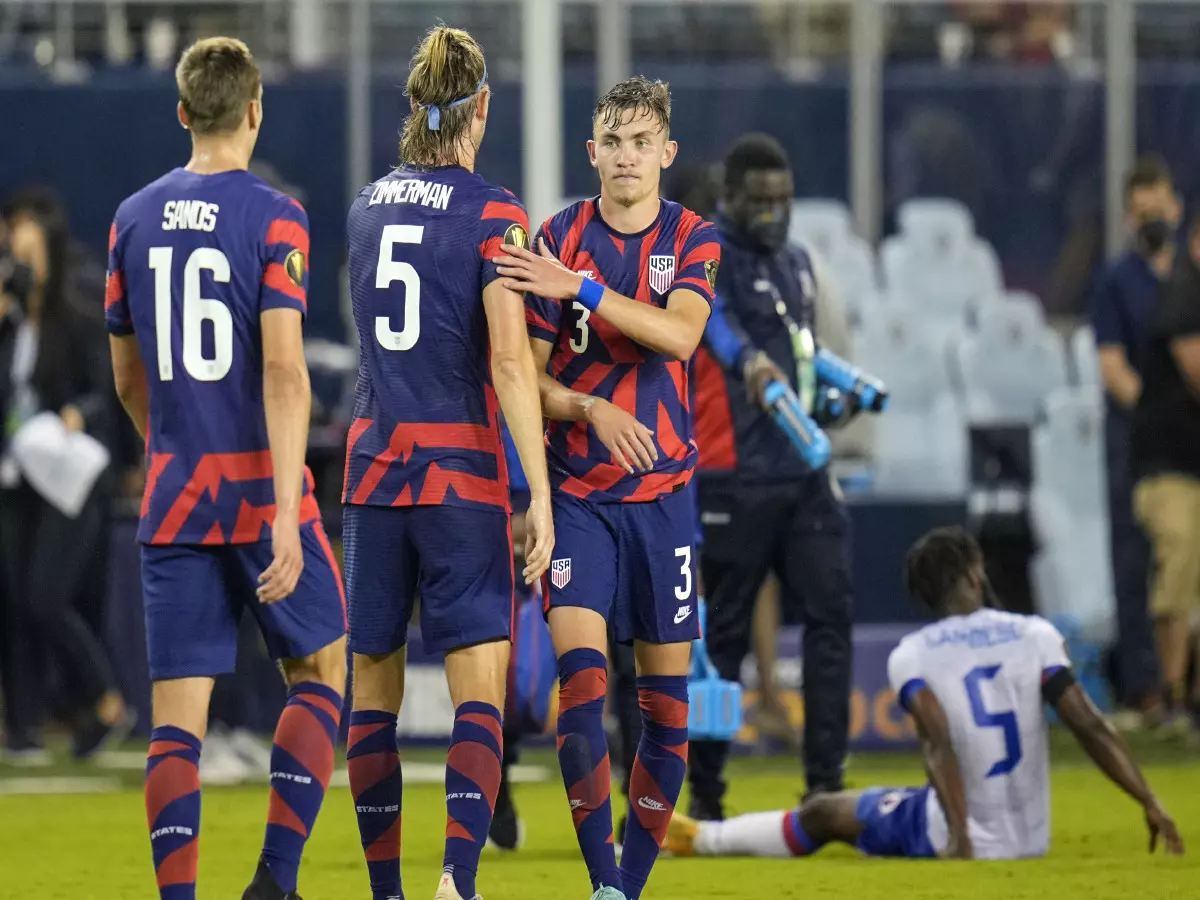 United States defender Sam Vines (3) celebrates with defender Walker Zimmerman (5) and defender James Sands (16)