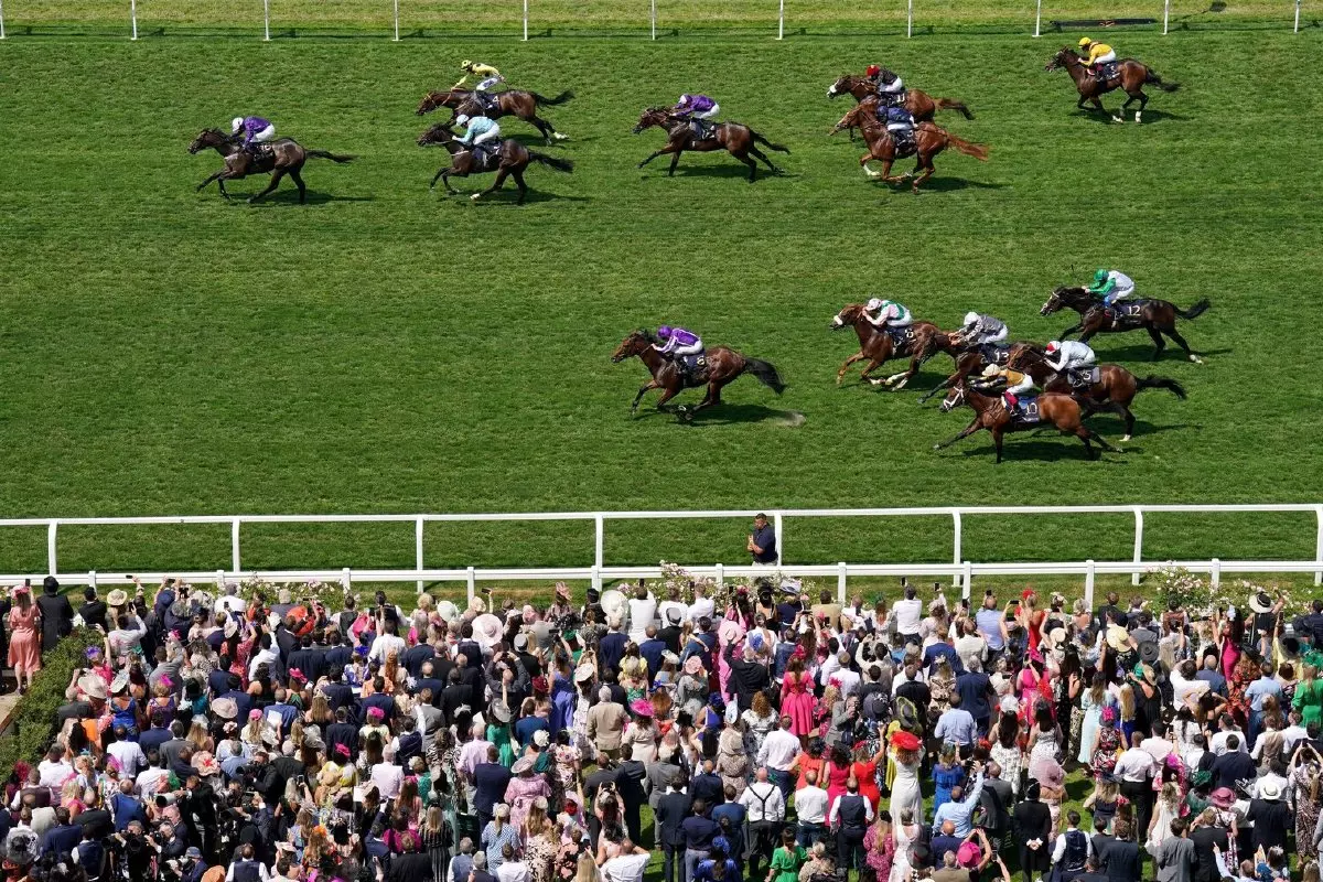 Valiant Force ridden by Rossa Ryan (left) on their way to winning the Norfolk Stakes