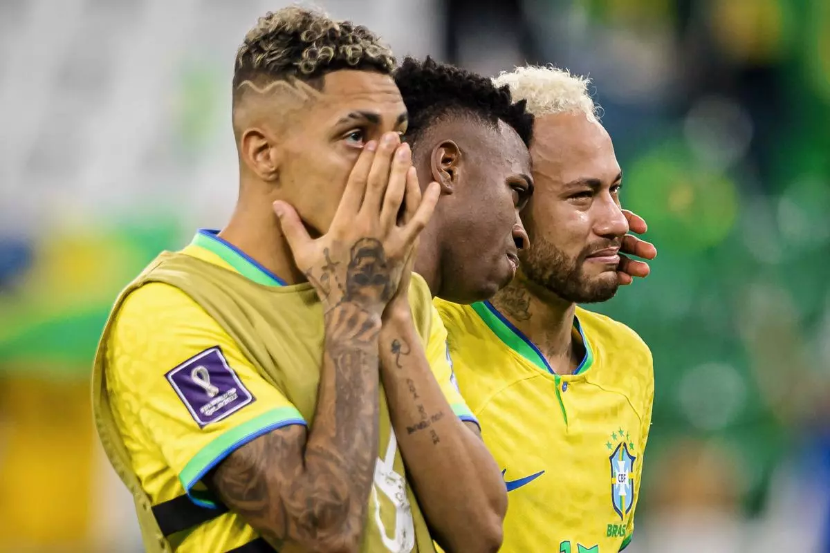 Vinicius Junior of Brazil and Neymar Jr. of Brazil cry after elimination by penalty kicks