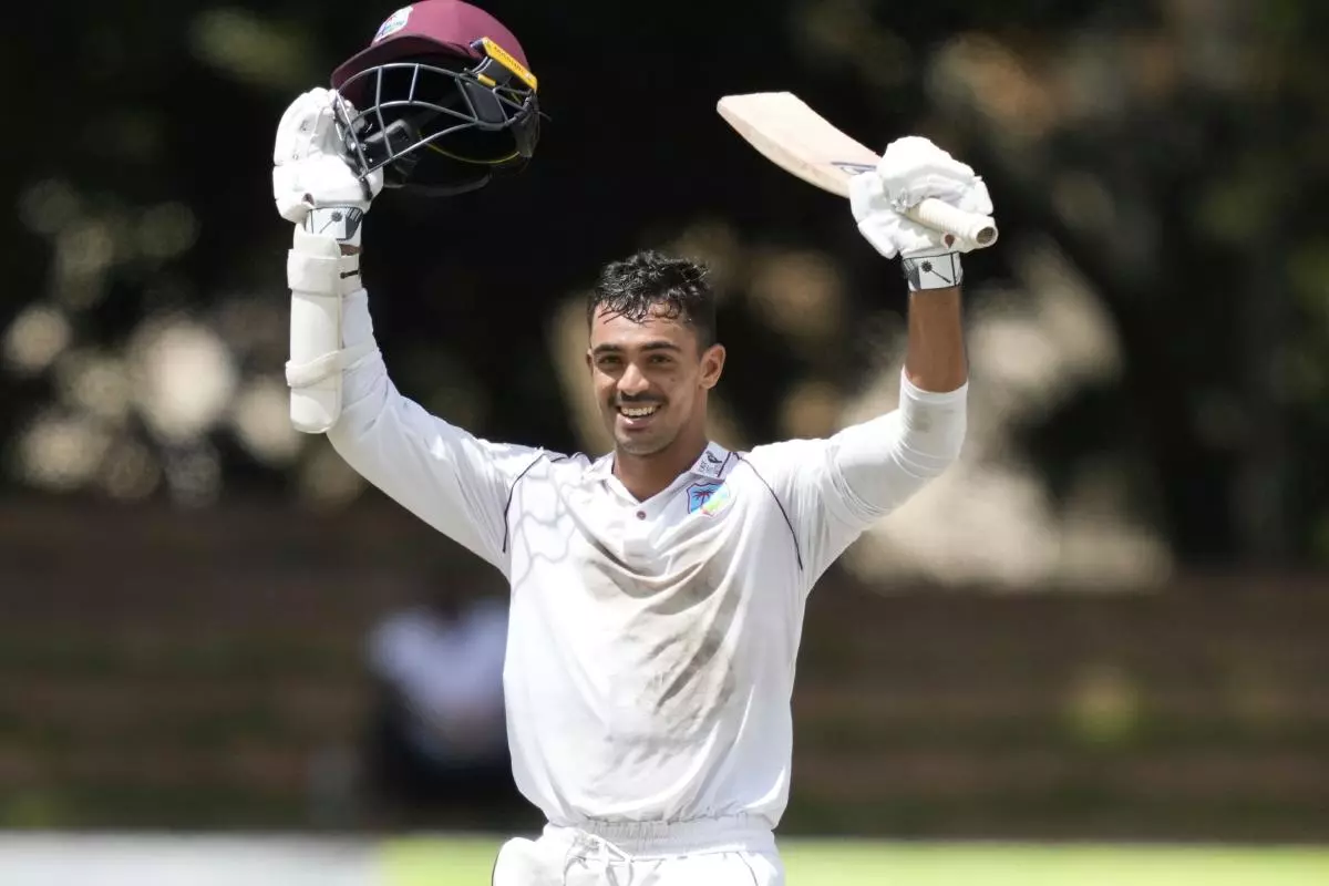 West Indies batter Tagenarine Chanderpaul celebrates after scoring 200 runs against Zimbabwe