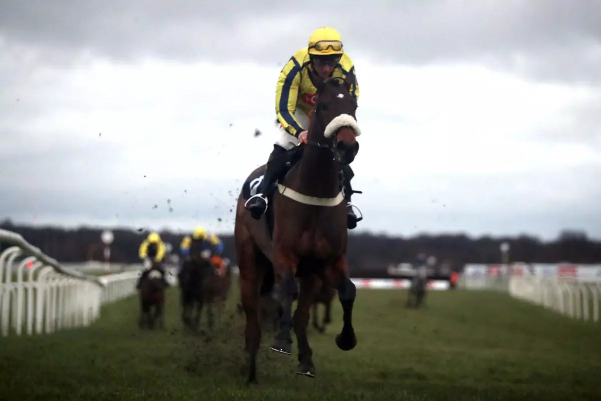 Willmount ridden by jockey Jamie Moore wins the Good Luck "Beep Beep Burrow" Open Maiden National Hunt Flat