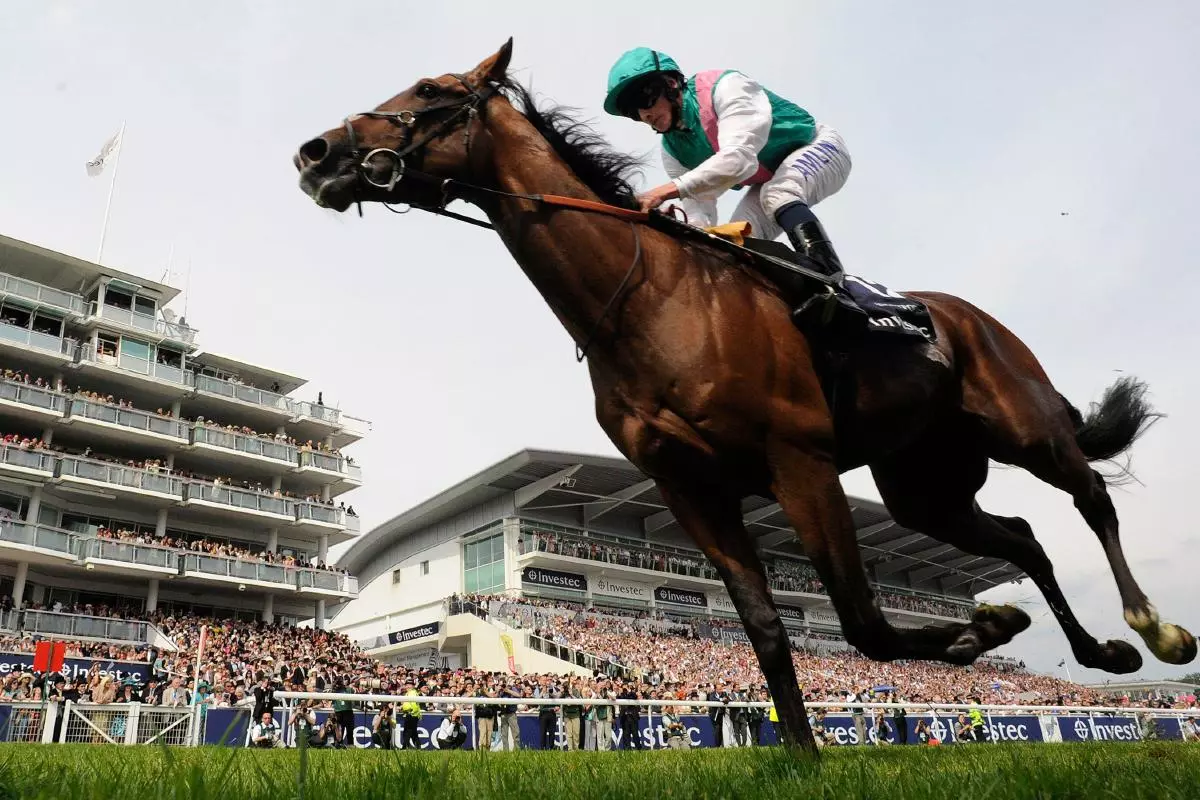 Workforce and Ryan Moore win the Epsom Derby in 2010