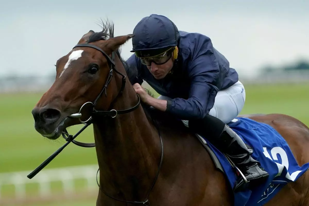 Ylang Ylang ridden by Ryan Moore as it goes onto win the Kildare House Hotel Maiden during day one of the Dubai Duty Free Irish Derby Festival - June 2023
