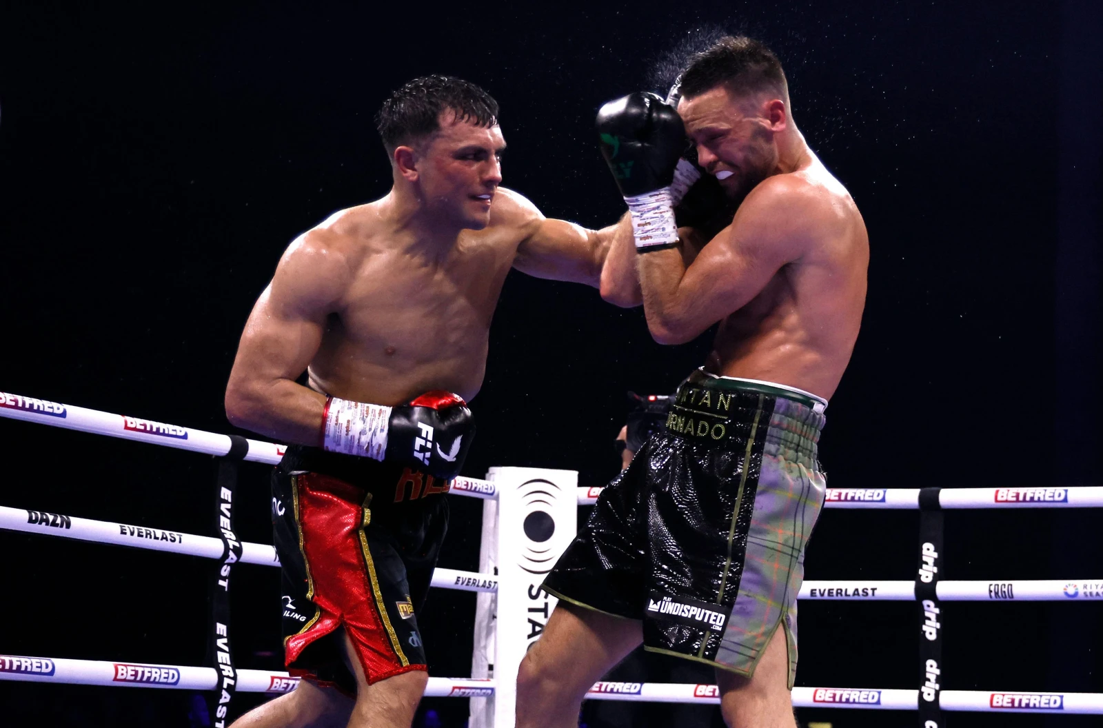 Jack Catterall strikes Josh Taylor