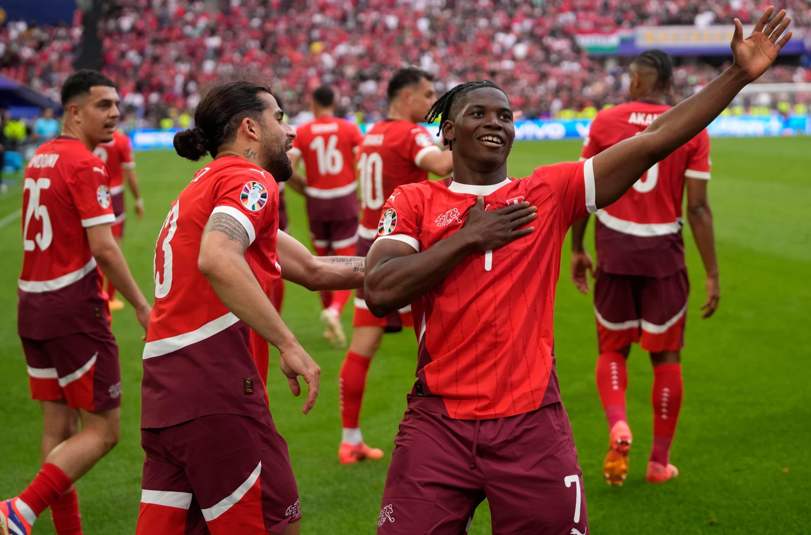 Breel Embolo and Switzerland celebrate at Euro 2024