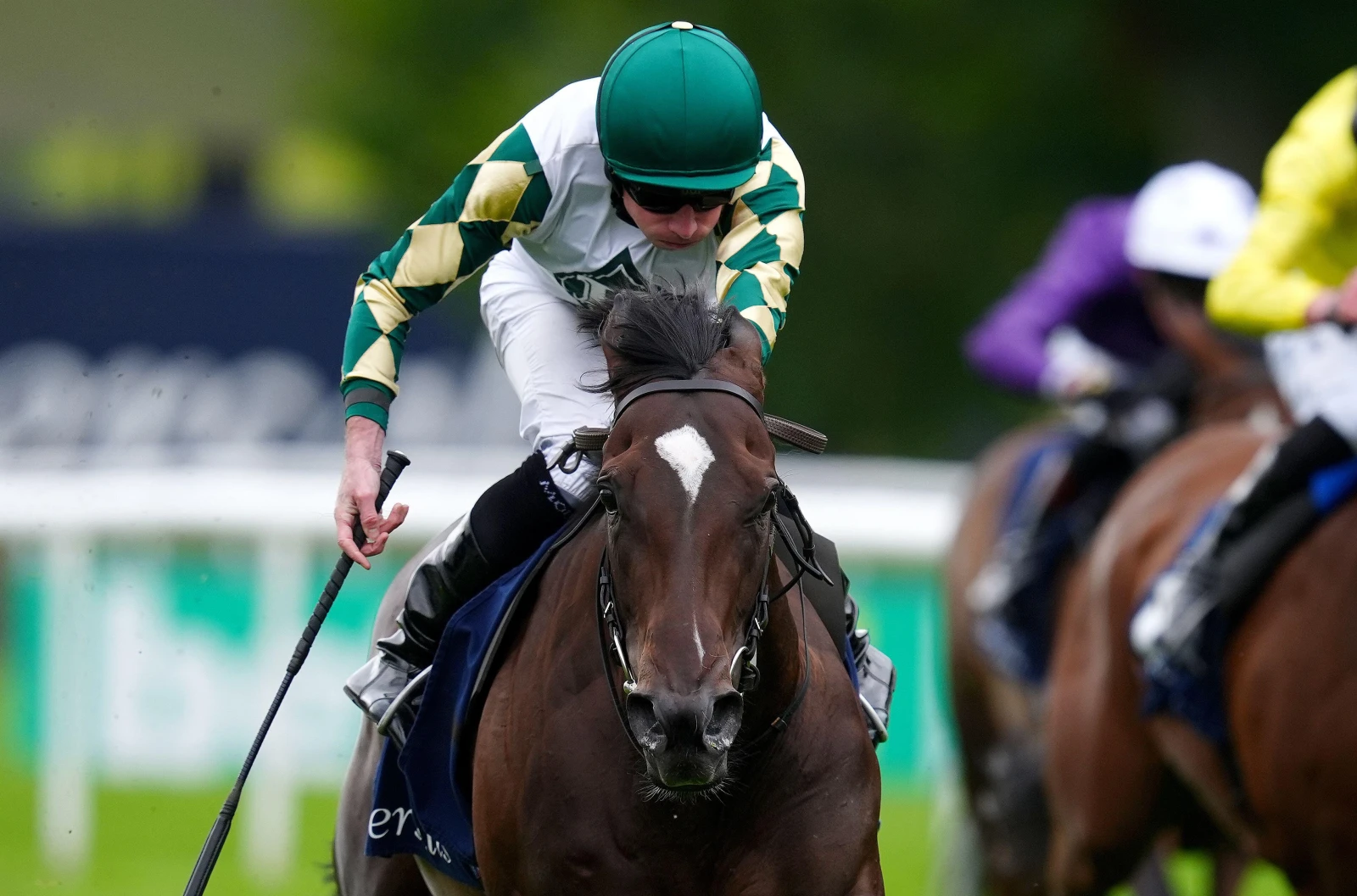 Porta Fortuna ridden by Ryan Moore coming home to win the Tattersalls Falmouth Stakes