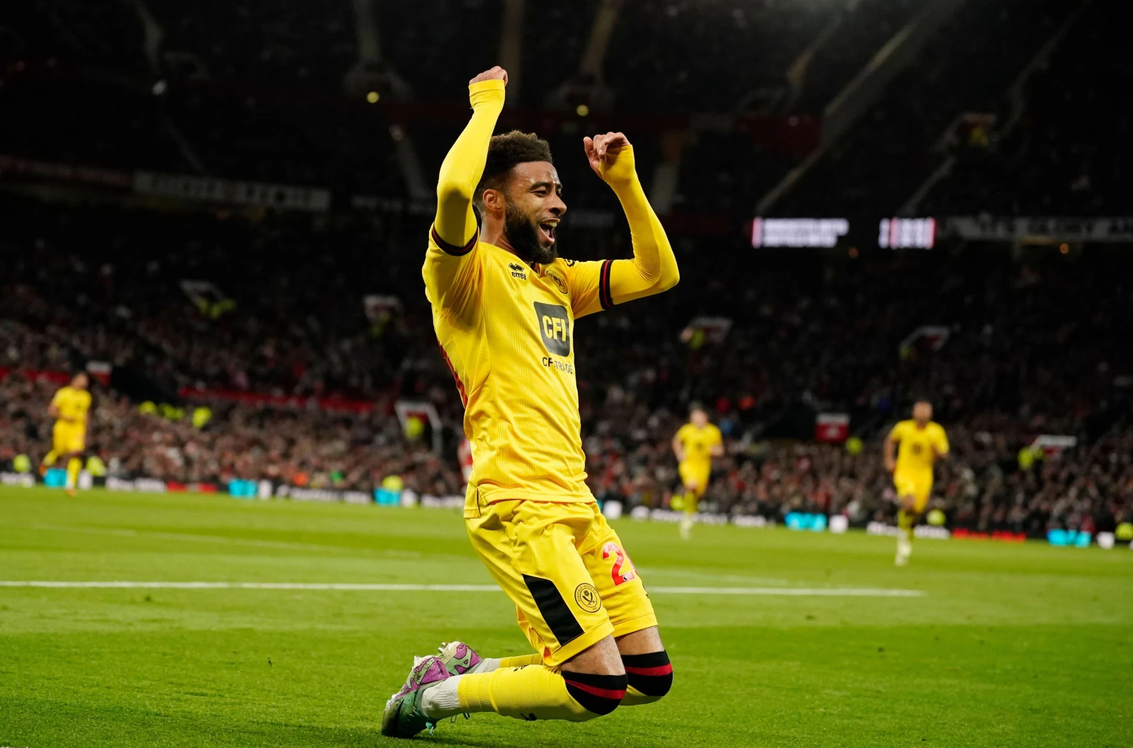 Sheffield United's Jayden Bogle celebrates scoring at Old Trafford