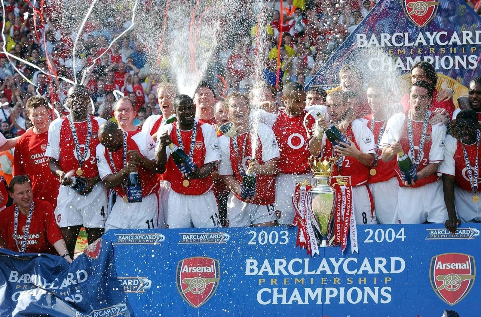 Arsenal players celebrating victory in the Premier League