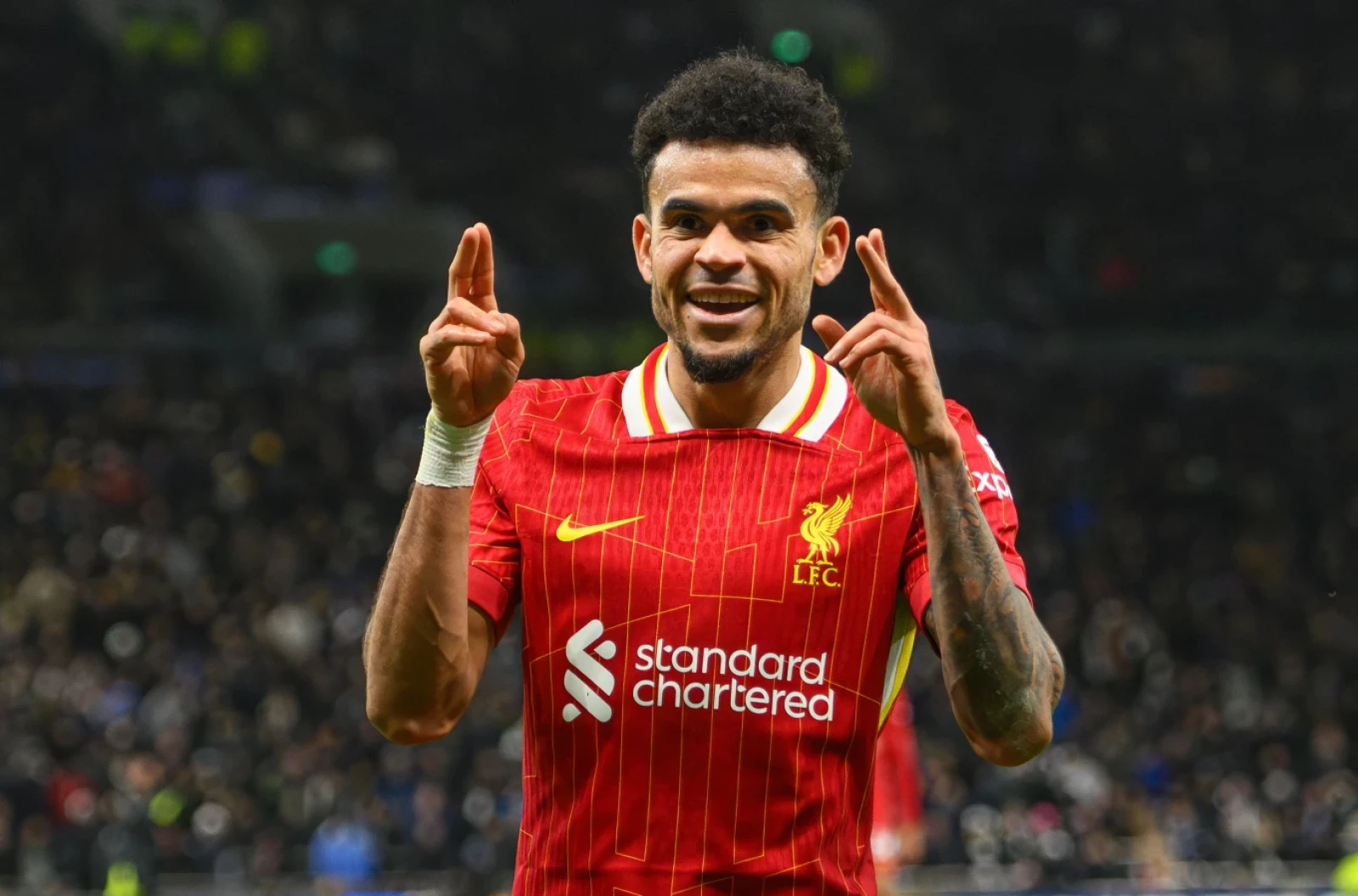 Liverpool forward Luis Diaz celebrates scoring his second goal