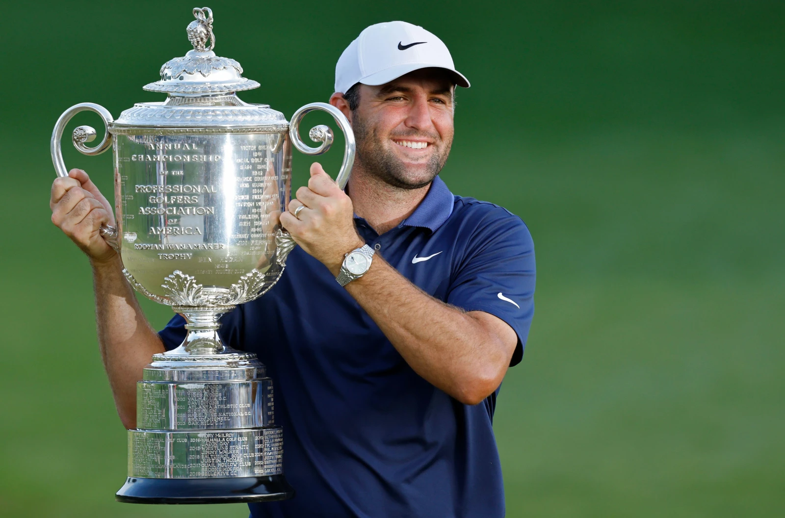 Scottie Scheffler holds the Wanamaker Trophy after winning the 2025 PGA Championship