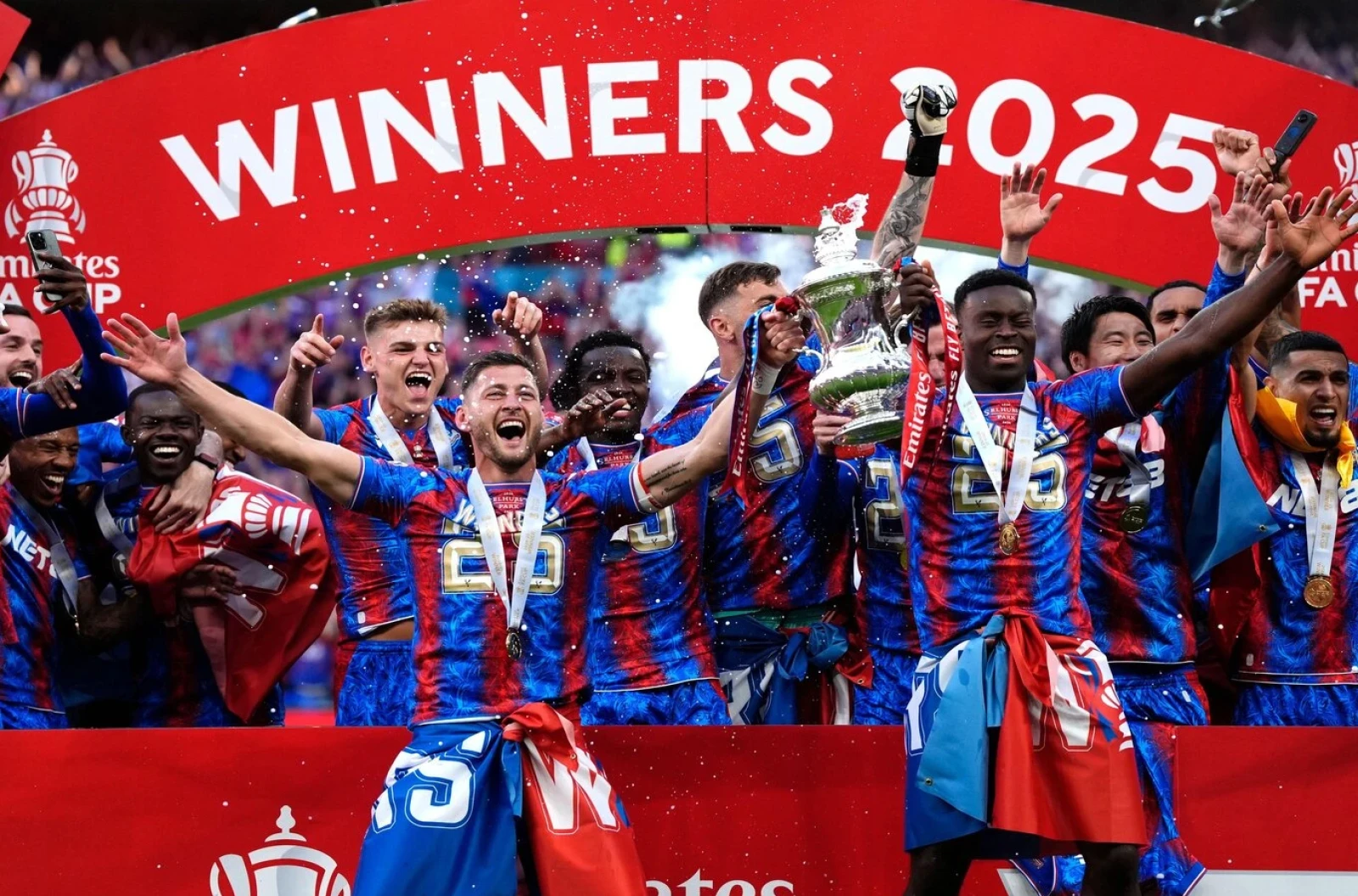 Crystal Palace's Joel Ward and Mark Guehi lift the 2025 FA Cup