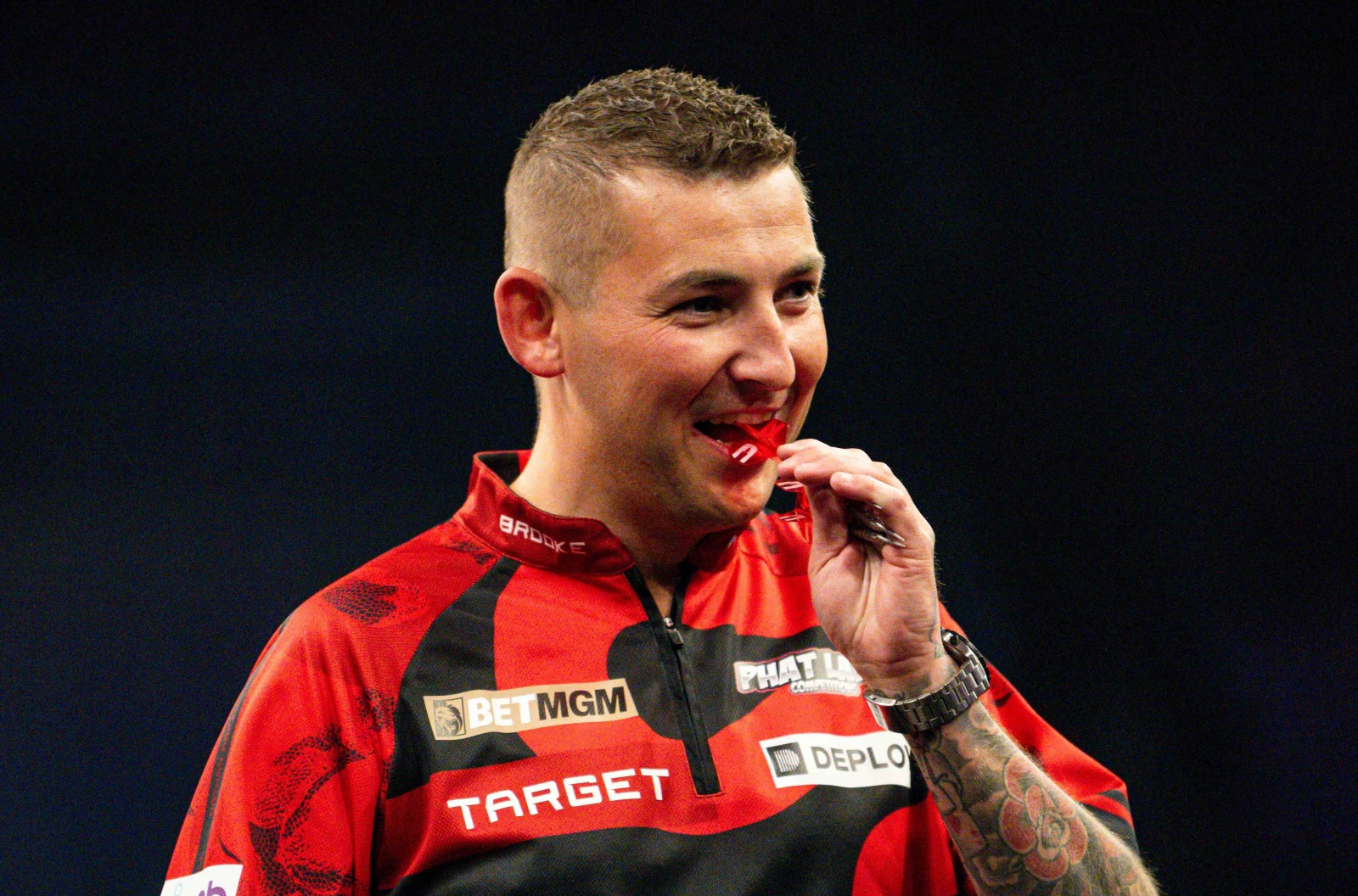 Nathan Aspinall in action at the Premier League Darts
