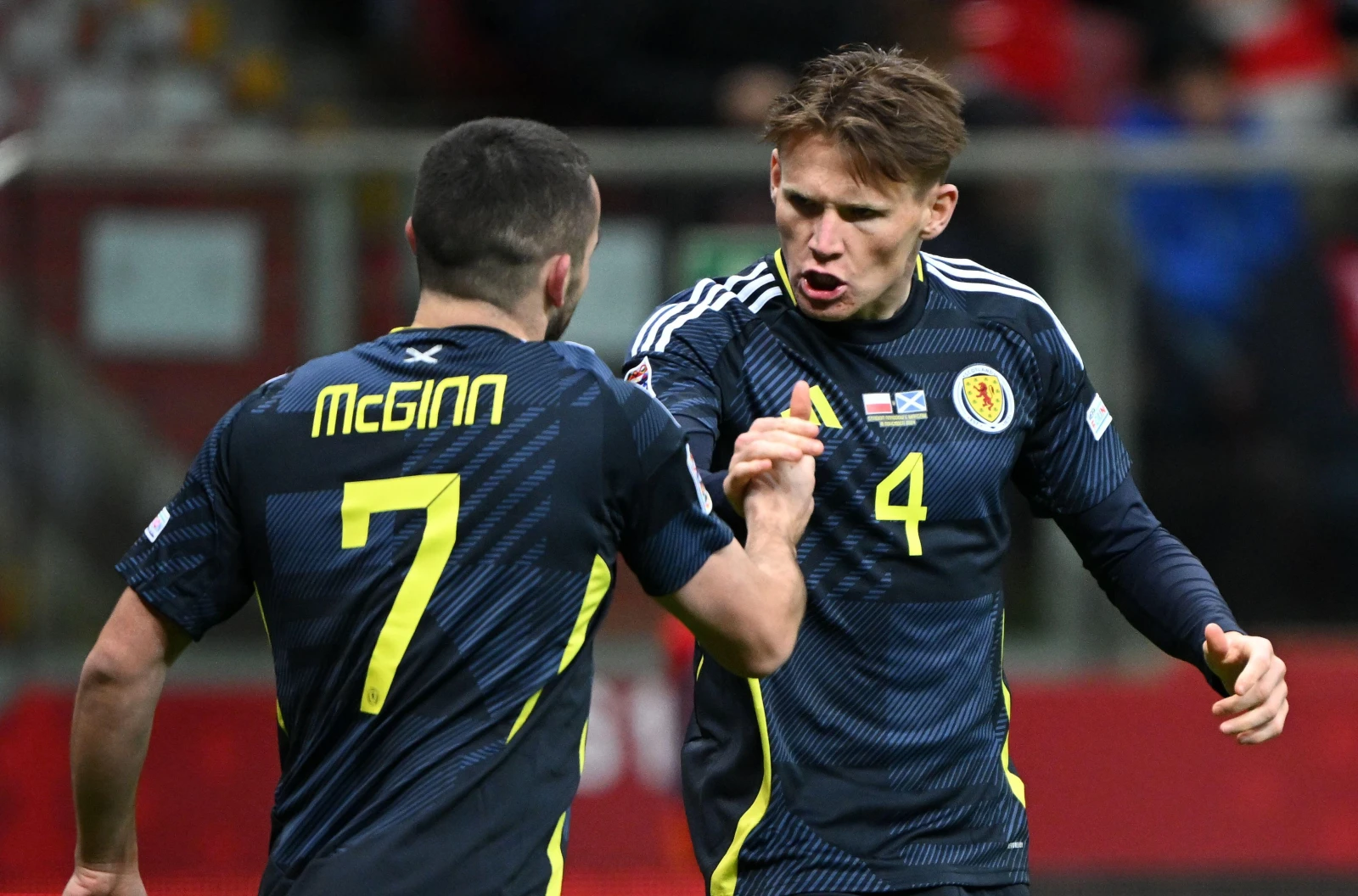 Scotland's John McGinn celebrates scoring their side's first goal of the game with Scott McTominay during the UEFA Nations League