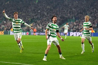 Nicolas Kuhn celebrates scoring for Celtic in the Champions League