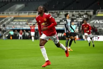 Aaron Wan-Bissaka scores a goal for Manchester United against Newcastle United in 2020