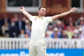Australia's Josh Hazlewood celebrates the wicket of England's Ben Stokes