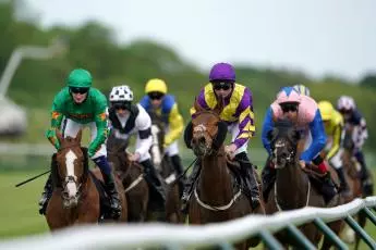 Gyenyame ridden by jockey Rob Hornby (centre) in the Racing TV Profits Returned to Racing Handicap at Nottingham racecourse