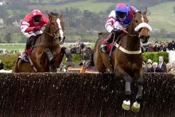 Looks Like Trouble (right) jumps the last en route to victory in the 2000 Cheltenham Gold Cup