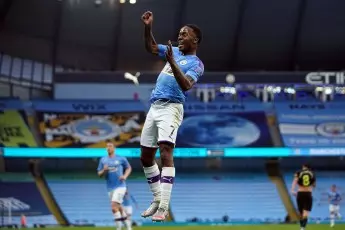 Raheem Sterling celebrates a goal against Arsenal in June 2020