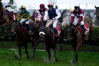 Runners and riders jump first fence Glenfarclas Chase