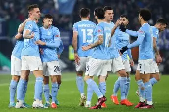 Sergej Milinkovic Savic of Lazio (L) celebrates with his teammates